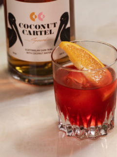 Smuggleroni coconut rum negroni cocktail with Coconut Cartel rum