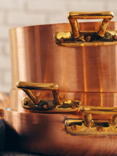 New copper cookware stacked up