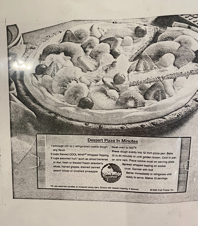 A black-and-white photocopy of a magazine clipping from 1996 for a cookie pizza recipe.