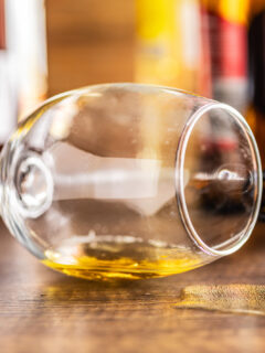 Empty spilled glass of beer on a table.